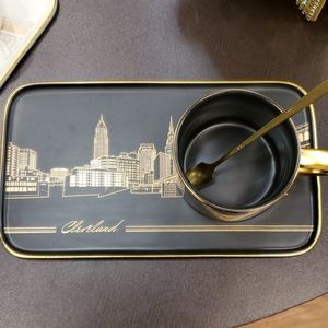 Cup Tray And Spoon With Sky Line Of Cleveland.